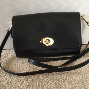Coach-leather purse. Never used.